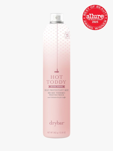 Drybar Hot Toddy Heat Protectant Mist in branded pink gradient aerosol bottle on light gray background with red Allure Best of Beauty seal in the top right corner