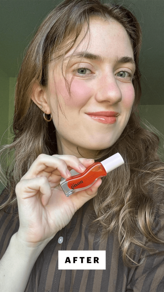 Blackman after applying the Gisou Honey Infused Lip Oil in Mango onto her lips