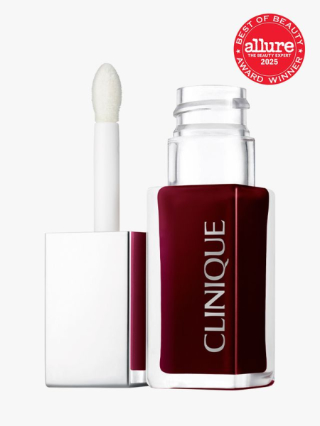 Clinique Pop Lip + Cheek Oil in Black Honey in branded glass bottle with silver cap with attached doe foot applicator on light gray background with red Allure Best of Beauty seal in the top right corner